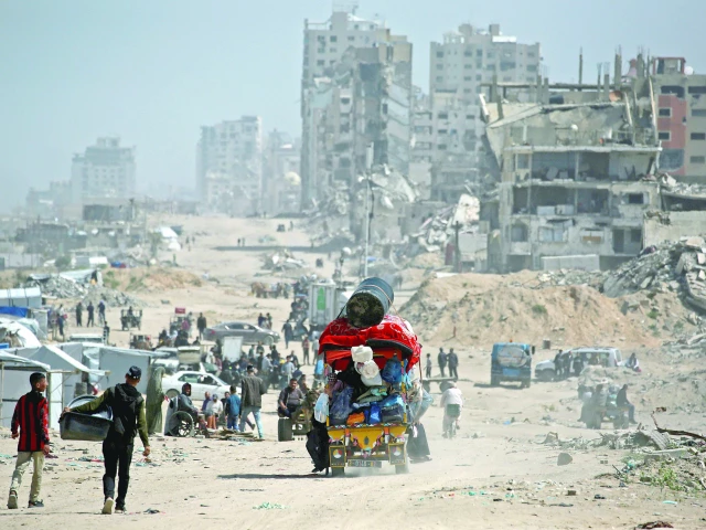 people commute along the al rashid road the only route linking the northern and southern parts of the palestinian territory photo afp people commute along the al rashid road the only route linking the northern and southern parts of the palestinian territory photo afp