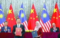 china tells trump to stop blackmailing