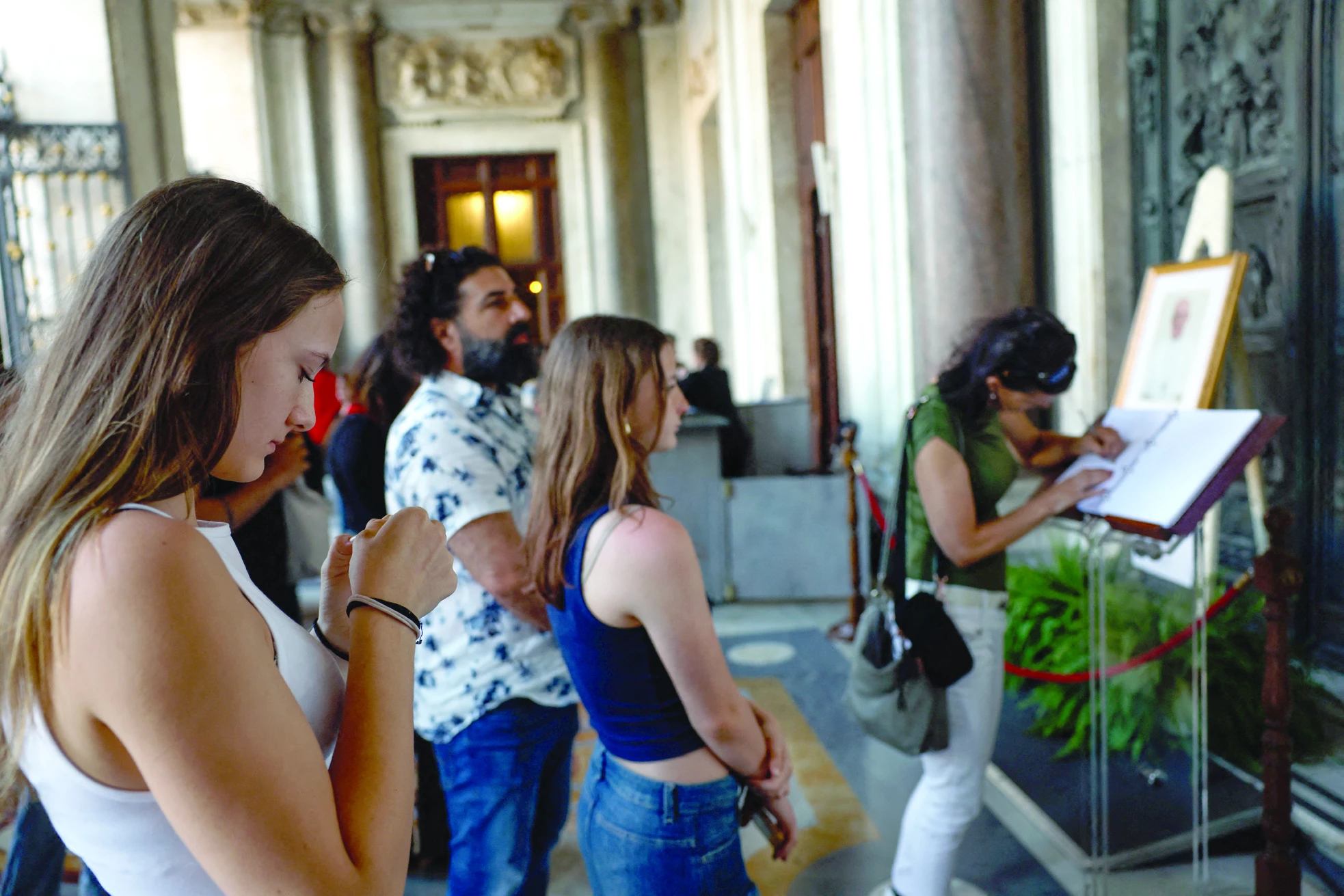 people line up to write a message in a condolence book for pope francis at the papal basilica of saint mary major santa maria maggiore where he will be buried in rome photo reuters people line up to write a message in a condolence book for pope francis at the papal basilica of saint mary major santa maria maggiore where he will be buried in rome photo reuters