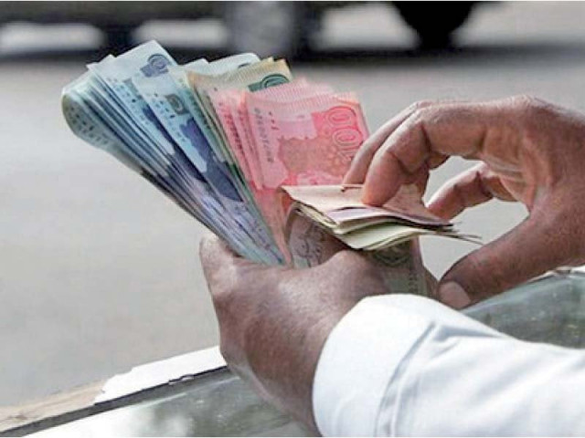 the finance ministry placed total demand for rs14 8 trillion before the national assembly under the head of charged expendi tures photo reuters the finance ministry placed total demand for rs14 8 trillion before the national assembly under the head of charged expendi tures photo reuters