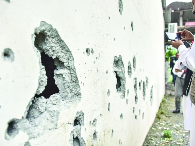 a partially damaged wall of the neelum jhelum hydropower project is pictured following an indian missile strike in nausari about 40km from muzaffarabad photo afp a partially damaged wall of the neelum jhelum hydropower project is pictured following an indian missile strike in nausari about 40km from muzaffarabad photo afp