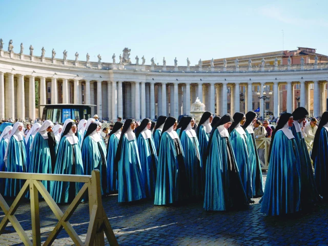 pilgrims from the sister adorers of the royal heart of jesus a society of apostolic life take part in a procession on st peter s square with the colonnade in the background in the vatican photo afp pilgrims from the sister adorers of the royal heart of jesus a society of apostolic life take part in a procession on st peter s square with the colonnade in the background in the vatican photo afp