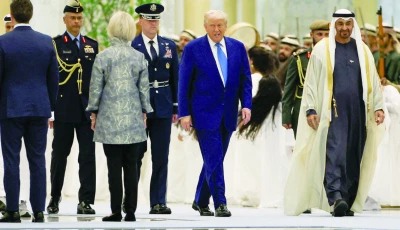 us president donald trump walks with uae president sheikh mohamed bin zayed al nahyan during their meeting at qasr al watan in abu dhabi uae photo reuters