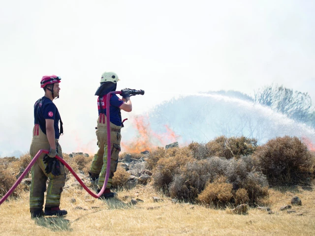 a firefighter responds to a wildfire between urla and cesme districts of izmir turkey photo reuters a firefighter responds to a wildfire between urla and cesme districts of izmir turkey photo reuters