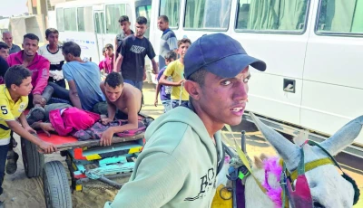 palestinians transport people who were killed or injured while trying to get humanitarian aid into the red cross field hospital in the mawasi area of rafah in the southern gaza strip photo afp