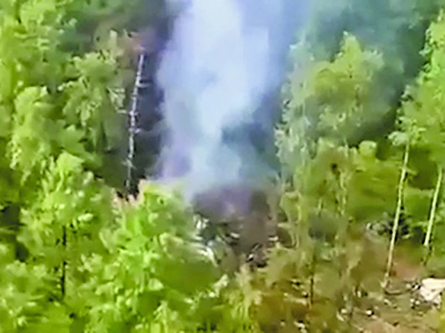 a videograb shows aerial view of the crash site of the antonov an 24 passenger plane outside the town of tynda in russia s far eastern amur region photo afp a videograb shows aerial view of the crash site of the antonov an 24 passenger plane outside the town of tynda in russia s far eastern amur region photo afp
