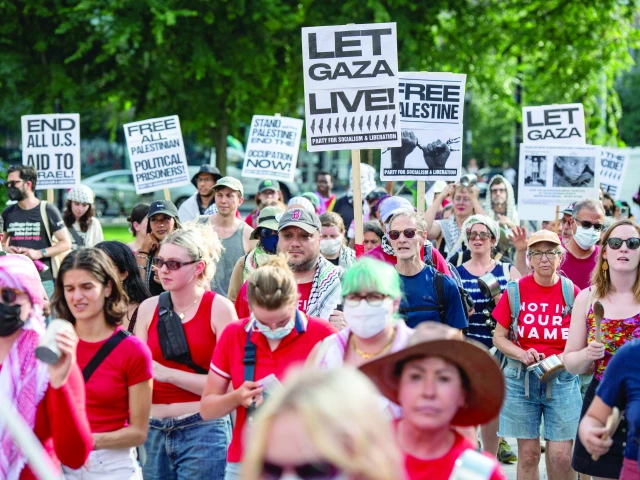 pro palestinian demonstrators march in the seaport district during a protest and rally in boston photo afp pro palestinian demonstrators march in the seaport district during a protest and rally in boston photo afp