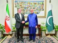 foreign minister ishaq dar shakes hands with his iranian counterpart abbas araghchi during a meeting at the foreign ministry in islamabad photo afp