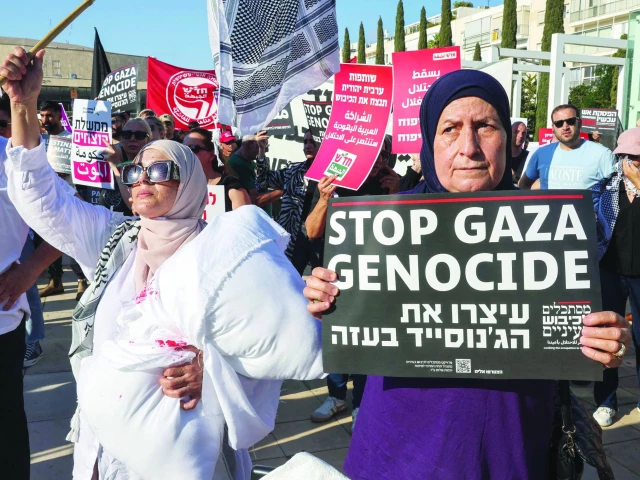 arab israeli and israeli left wing activists hold placards and photos of malnurished children during a protest at habima square in tel aviv against the ongoing war and the catastrophic humanitarian situation in the gaza strip photo afp arab israeli and israeli left wing activists hold placards and photos of malnurished children during a protest at habima square in tel aviv against the ongoing war and the catastrophic humanitarian situation in the gaza strip photo afp