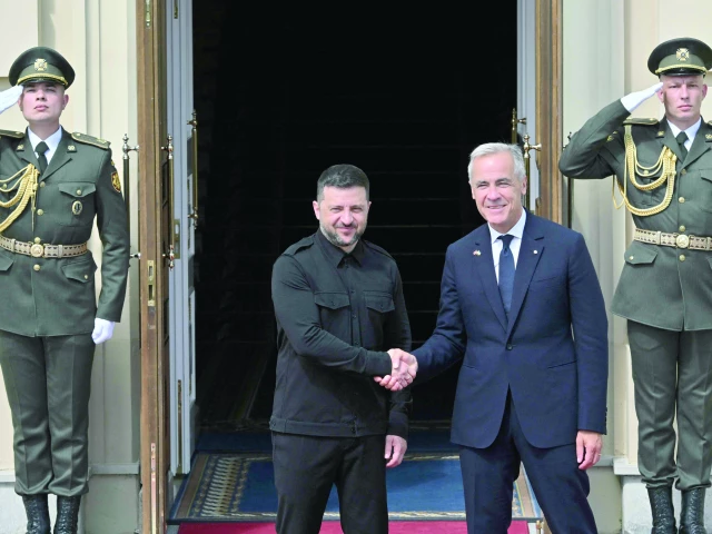 ukrainian president volodymyr zelensky shakes hands prime minister of canada mark carney during their meeting prior the talks in kyiv photo afp ukrainian president volodymyr zelensky shakes hands prime minister of canada mark carney during their meeting prior the talks in kyiv photo afp