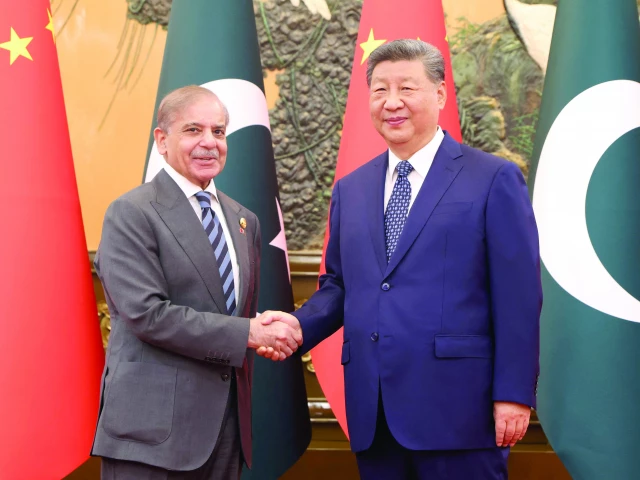 chinese president xi jinping shakes hands with prime minister shehbaz sharif at the great hall of the people in beijing photo reuters chinese president xi jinping shakes hands with prime minister shehbaz sharif at the great hall of the people in beijing photo reuters