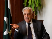 defence minister khawaja muhammad asif during an interview photo reuters