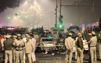 eight killed in mysterious car blast near delhi s red fort
