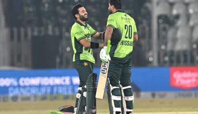 pakistan s mohammad rizwan l and pakistan s hussain talat r celebrate their team s victory at the end of the third one day international odi match against sri lanka at the rawalpindi cricket stadium in rawalpindi on november 16 photo afp