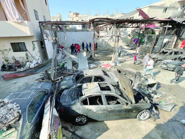 people inspect the damage in the aftermath of an israeli strike on the ain al hilweh camp for palestinian refugees near sidon in southern lebanon photo afp people inspect the damage in the aftermath of an israeli strike on the ain al hilweh camp for palestinian refugees near sidon in southern lebanon photo afp