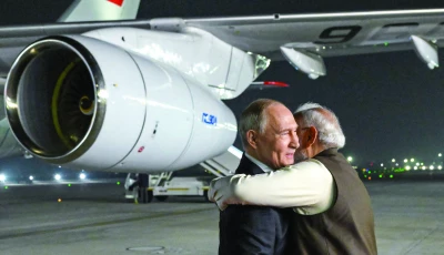 russia s president vladimir putin is welcomed by indian prime minister narendra modi upon his arrival at palam air force base in new delhi photo afp
