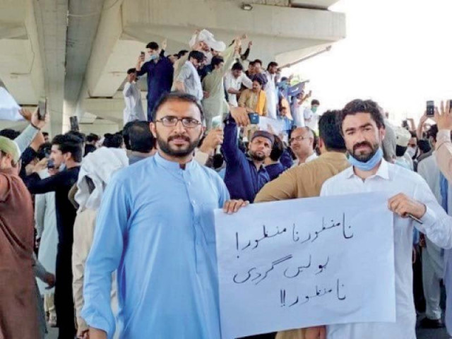 abuse of power by police not acceptable reads a placard displayed by protesters at a demonstration in peshawar photo express abuse of power by police not acceptable reads a placard displayed by protesters at a demonstration in peshawar photo express
