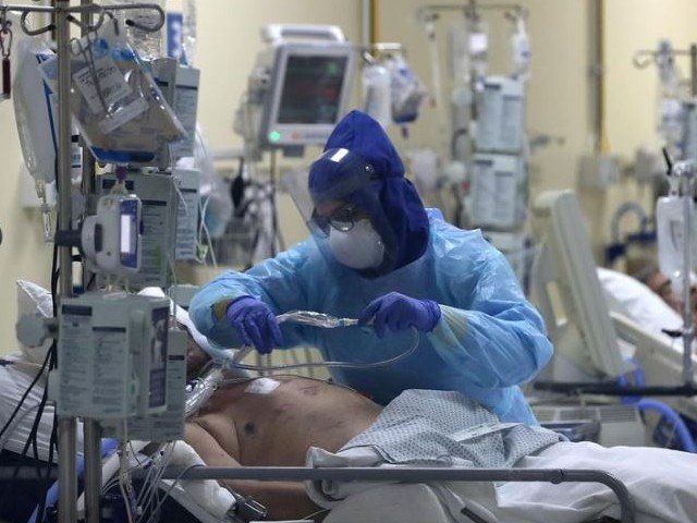 a health worker takes care of a patient infected with the coronavirus disease covid 19 inside an intensive care unit of the university of chile 039 s clinical hospital in santiago chile june 18 2020 photo reuters file