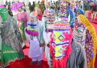 hindu couples arrive in festive attire to be married during a mass marriage ceremony organised by the pakistan hindu council marking a celebration of tradition unity and social support photo afp