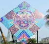 workers install a large kite model to celebrate the basant festival in lahore photo afp