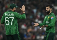 pakistan s shadab khan celebrates with captain salman agha after taking the wicket of usa s shayan jahangir during the 2026 icc men s t20 cricket world cup group stage match between pakistan and usa in colombo on february 10 2026 photo afp