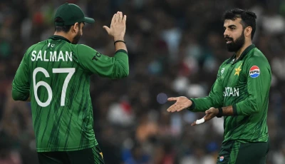 pakistan s shadab khan celebrates with captain salman agha after taking the wicket of usa s shayan jahangir during the 2026 icc men s t20 cricket world cup group stage match between pakistan and usa in colombo on february 10 2026 photo afp