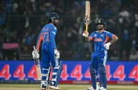 india s ishan kishan celebrates after scoring a half century during the 2026 icc men s t20 cricket world cup group stage match between india and namibia at the arun jaitley stadium in new delhi on february 12 2026 photo afp