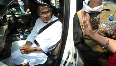 bnp chairman and election candidate tarique rahman greets his supporters as he leaves his residence in dhaka on february 13 2026 a day after bangladesh s general election photo afp