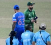 pakistan s captain salman agha walks past his indian counterpart suryakumar yadav after the toss before the start of the icc men s t20 cricket world cup 2026 group stage match between pakistan and india at the r premadasa stadium in colombo on february 15 2026 photo afp
