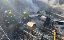 four killed as army helicopter crashes into market in iran