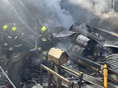 four killed as army helicopter crashes into market in iran four killed as army helicopter crashes into market in iran