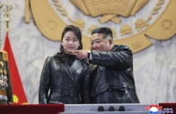 north korean leader kim jong un r and his daughter kim ju ae attending the military parade to commemorate the 9th congress of the workers party of korea at kim il sung square in pyongyang photo afp