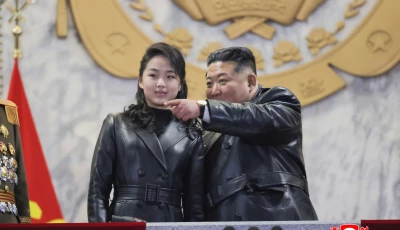 north korean leader kim jong un r and his daughter kim ju ae attending the military parade to commemorate the 9th congress of the workers party of korea at kim il sung square in pyongyang photo afp