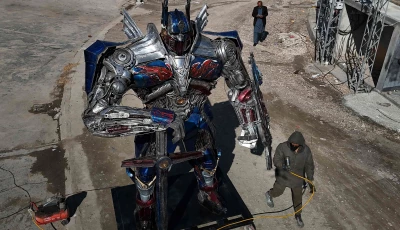 sculptor ehtisham jadoon working on a model of optimus prime a film character from transformers made from scrap metal at his studio on the outskirts of islamabad photo afp