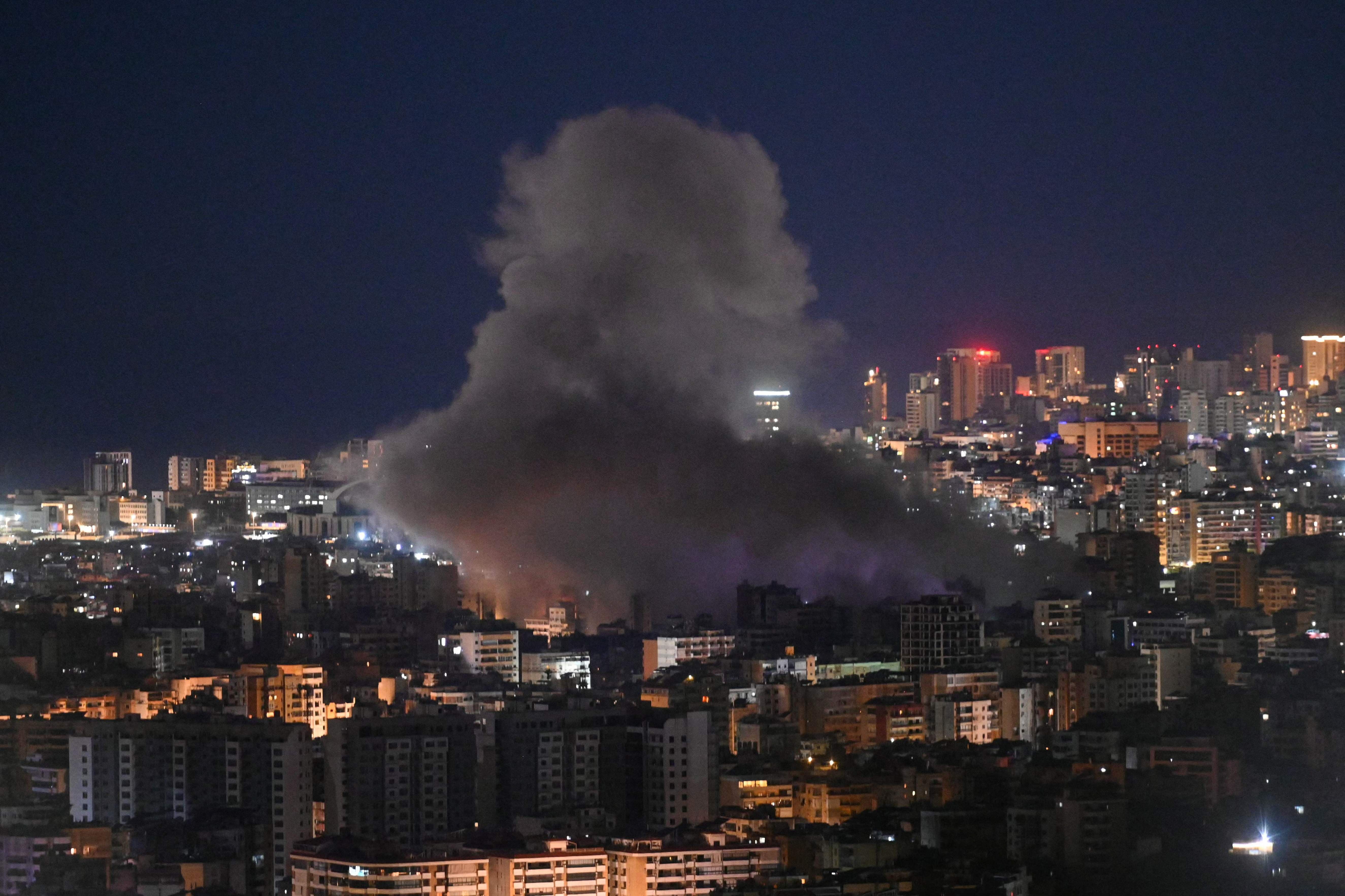Smoke rises from the site of an Israeli airstrike that targeted an area in Beirut's southern neighborhood on March 5, 2026. PHOTO: AFP