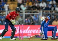england s wicketkeeper jos buttler stumps out india s captain suryakumar yadav during the 2026 icc men s t20 cricket world cup semi final match between india and england at the wankhede stadium in mumbai on march 5 2026 photo afp