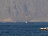 ships and tankers in the strait of hormuz off the coast of musandam oman april 18 2026 photo reuters file