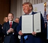 us president donald trump shows a signed executive order related to a new ai powered government website america gov during the website s national design studio launch event at the mellon auditorium in washington dc us september 29 2026 reuters