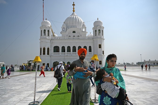 sikh pilgrims arrive to take part in a religious ritual on the occasion of the 481st death anniversary of baba guru nanak dev ji the founder of sikhism at the gurdwara darbar sahib in kartarpur near the india pakistan border on september 22 2020 afp file