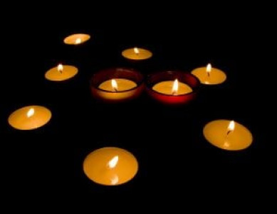 candlelit vigil for youths killed in london riots