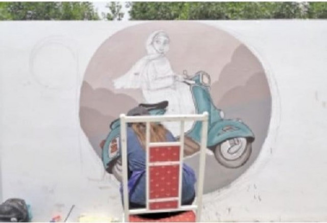 an artist makes a painting on a wall near the national stadium in karachi as part of the rang de karachi drive meant to both beautify the city and convey social awareness messages photo express an artist makes a painting on a wall near the national stadium in karachi as part of the rang de karachi drive meant to both beautify the city and convey social awareness messages photo express
