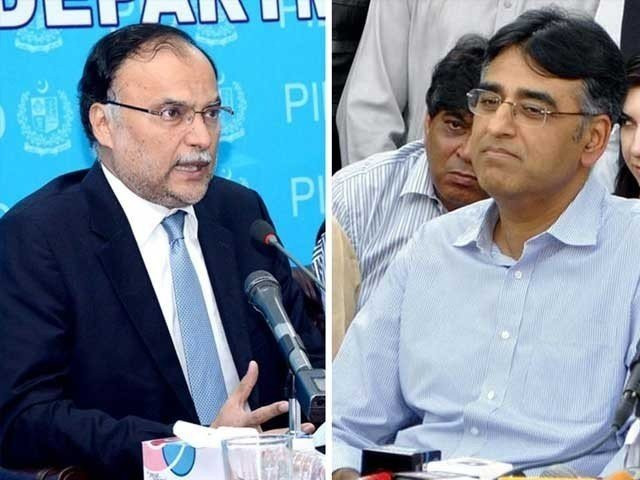 ahsan iqbal asad umar photo express