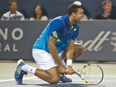 tsonga injury hands djokovic victory