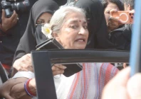 lady police arrest aurat march organiser sheema kermani outside the karachi press club on tuesday photo jalal qureshi express