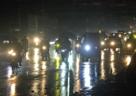 traffic moves slowly along korangi road during light rain as headlights and taillights reflect on the wet asphalt creating a shimmering nighttime scene of cars and motorbikes navigating the slick streets photo jalal qureshi express traffic moves slowly along korangi road during light rain as headlights and taillights reflect on the wet asphalt creating a shimmering nighttime scene of cars and motorbikes navigating the slick streets photo jalal qureshi express