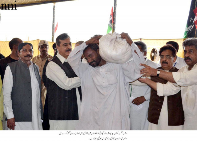 pm pays a visit watan cards loans to rescue rain hit badin pm pays a visit watan cards loans to rescue rain hit badin