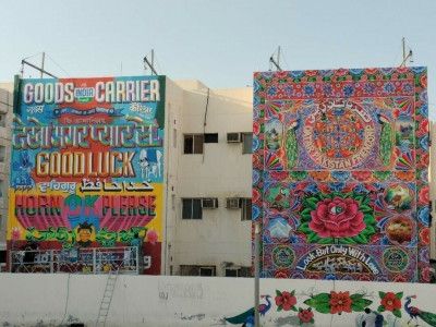 pakistani artists paint a mural in doha ahead of world cup 2022