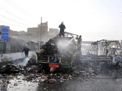 17 involved in karachi mini bus burning report 17 involved in karachi mini bus burning report