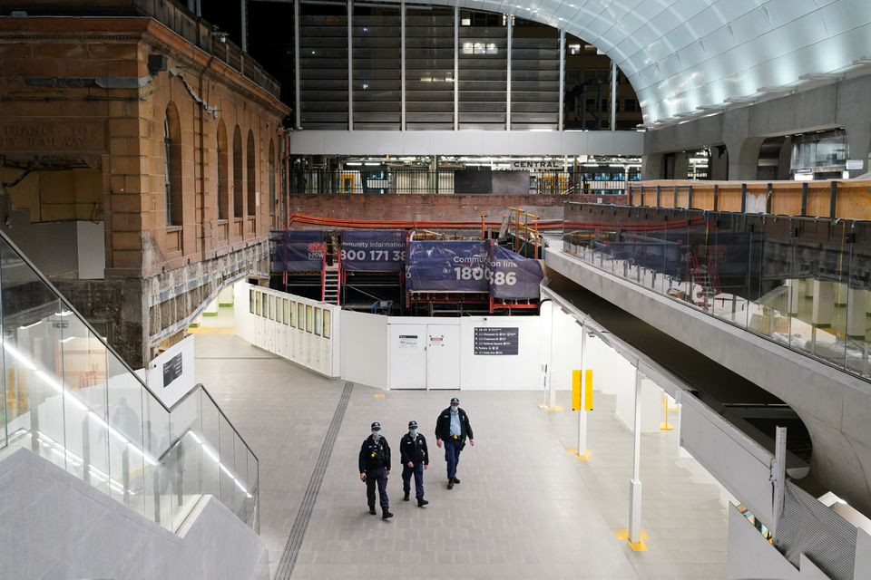 police officers patrol through the quiet central station in the city centre during a lockdown to curb the spread of a coronavirus disease covid 19 outbreak in sydney australia august 12 2021 photo reuters