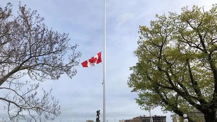 canada s national flag flies at half mast at the british columbia legislature in victoria after the remains of 215 children were discovered in a mass grave at the former kamloops indian residential school site photo reuters canada s national flag flies at half mast at the british columbia legislature in victoria after the remains of 215 children were discovered in a mass grave at the former kamloops indian residential school site photo reuters